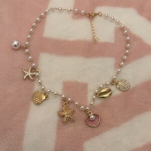 Gold and Pearl Charm Necklace